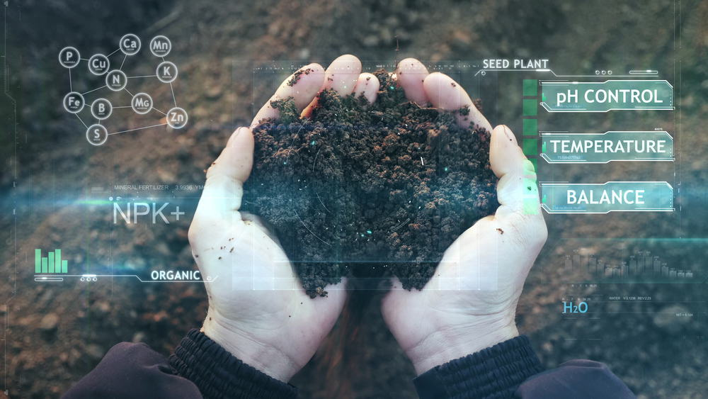 Future agriculture, Close-up hands with the ground